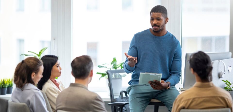 medium-shot-people-learning-together-office Leadership Training