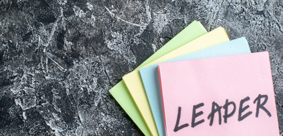 top-view-leader-written-note-with-stickers-gray-background Leadership Coaching Principles