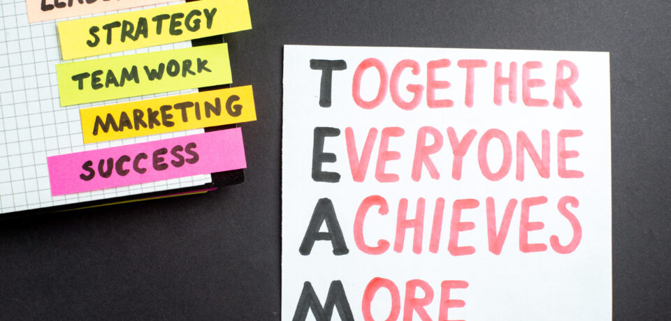 top-view-motivation-business-notes-with-notepad-dark-background-business-work-success-job-leadership-strategy-teamwork-marketing-office-team Are Leaders Born or Made